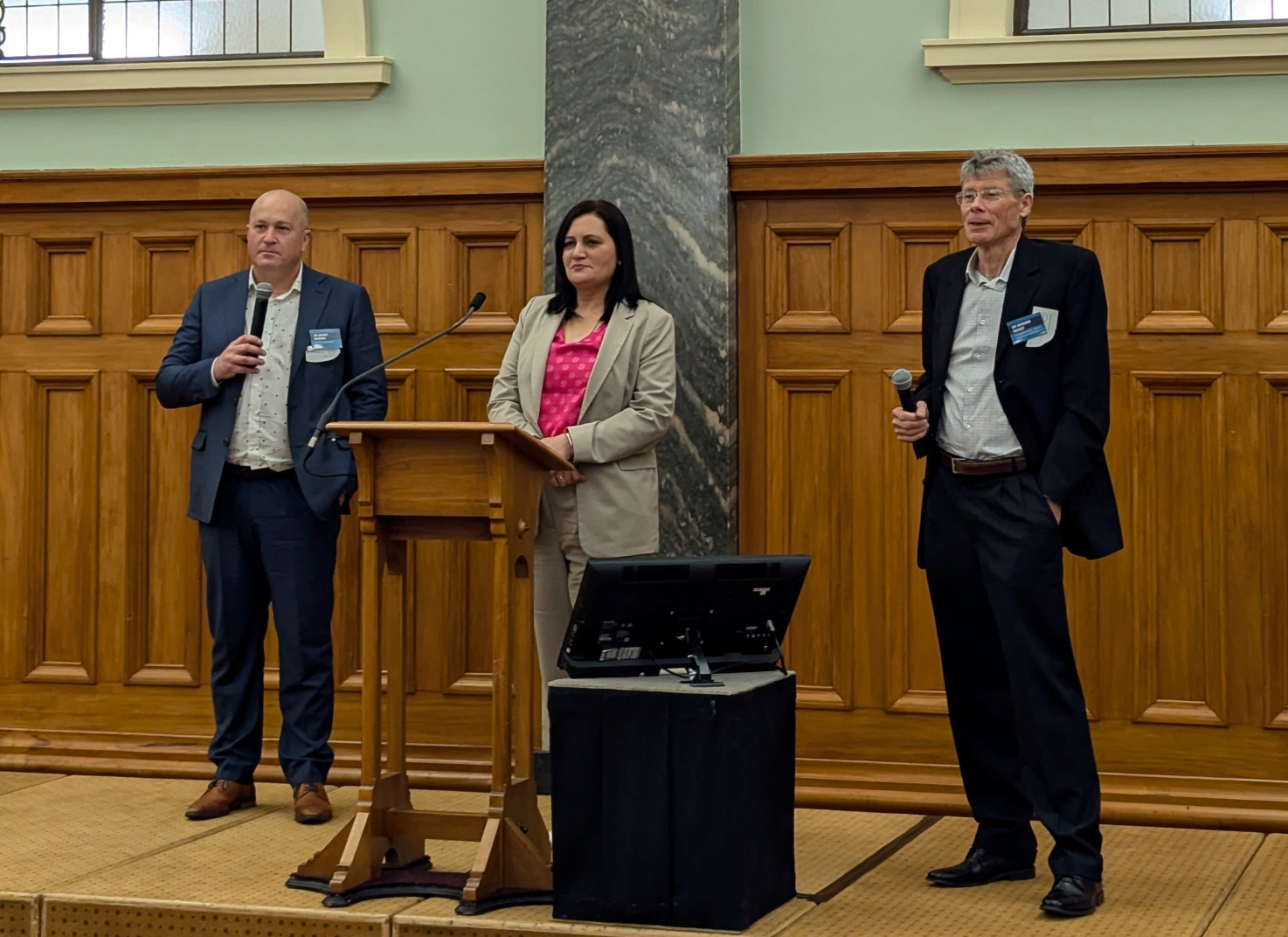 Event MC Dr Parmjeet Parmar stands between Dr Barker and Dr Smart as they answer MPs' questions